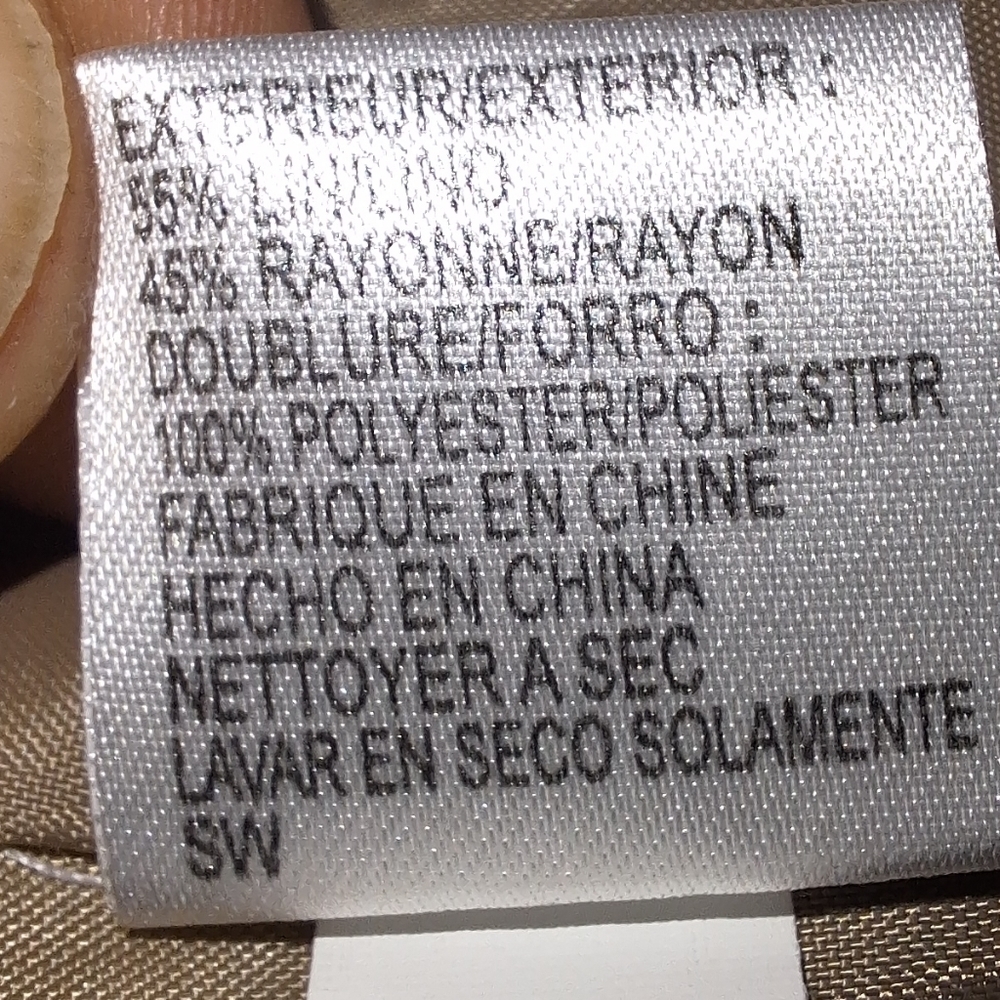 A Tahari short sleeve button-down top with a waist belt. Pre-loved - Picture 5 of 6